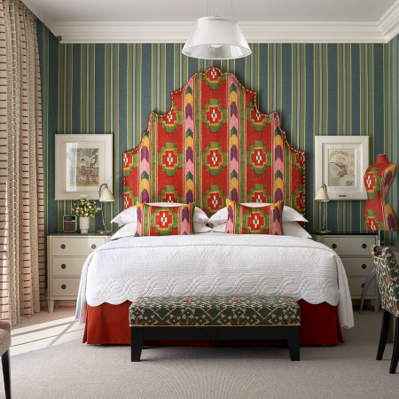 A communal interior space at a Firmdale hotel in New York City, showcasing curated, vibrant art and design details.