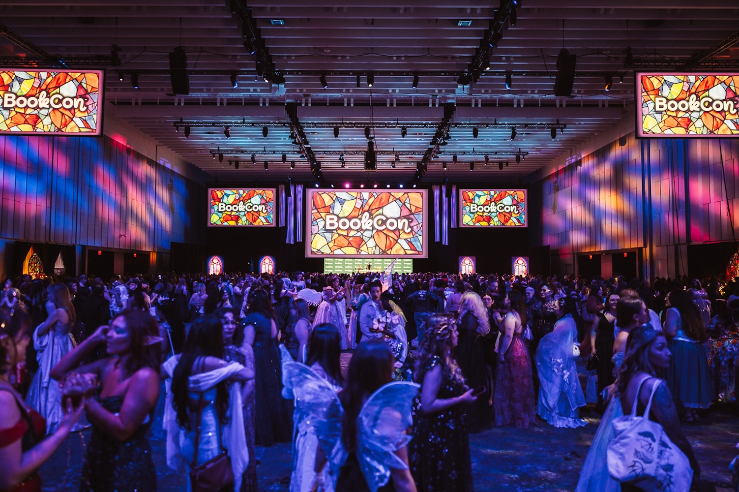People dressed up and dancing on a dance floor