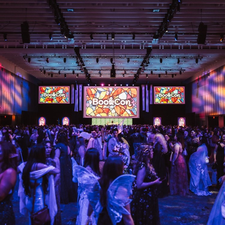 People dressed up and dancing on a dance floor
