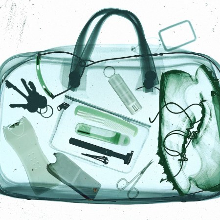 X-ray image of a duffel bag showing multiple prohibited items inside, including liquids and other flagged objects, highlighted during airport security screening.