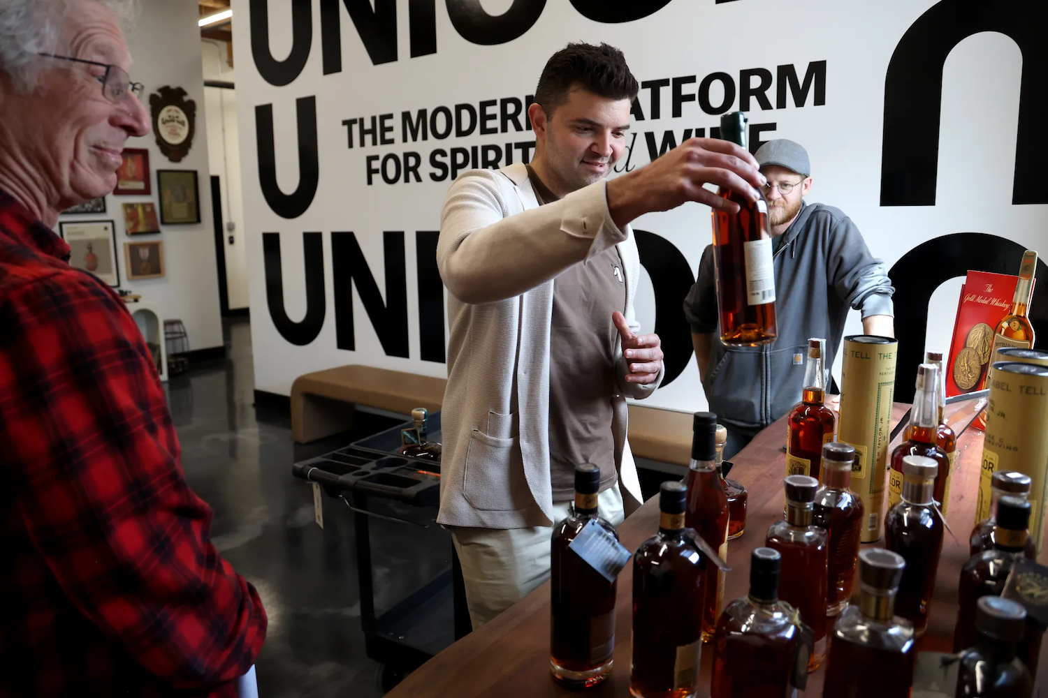 Phil Mikhaylov, the CEO and co-founder of Unicorn, checking out a lot of bourbon