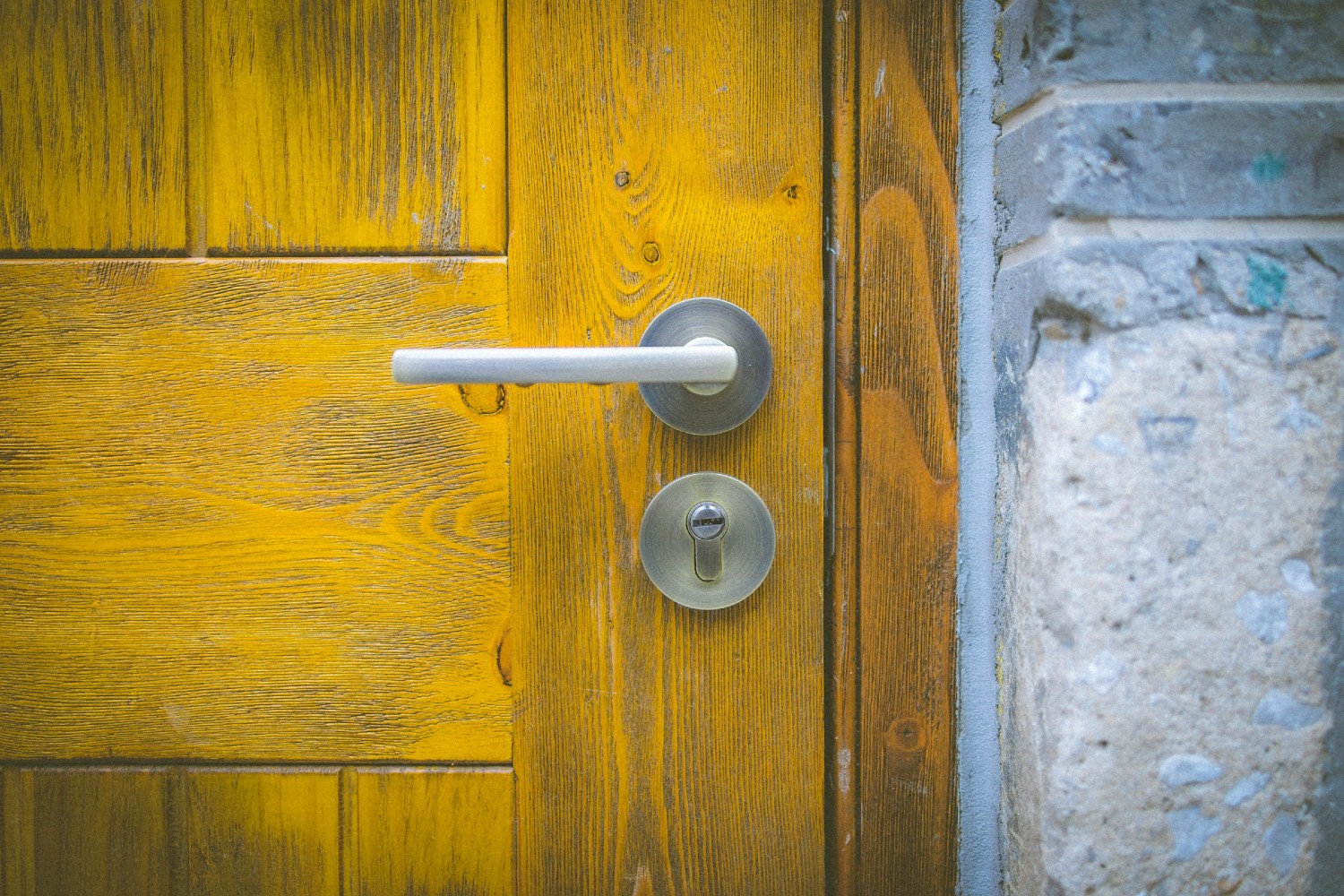 Doorknob on yellow door