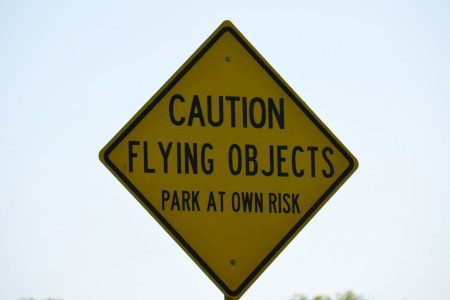 "Caution Flying Objects" sign