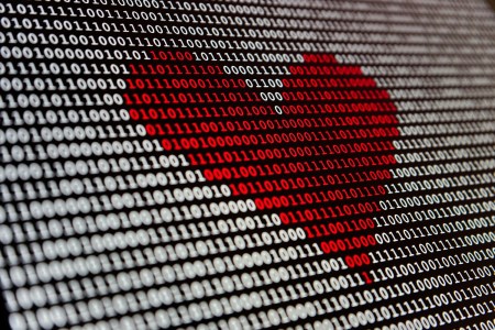 Heart over top of binary code