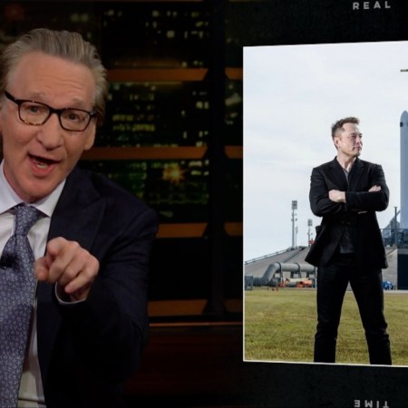 Bill Maher pointing with a photo of Elon Musk in the background