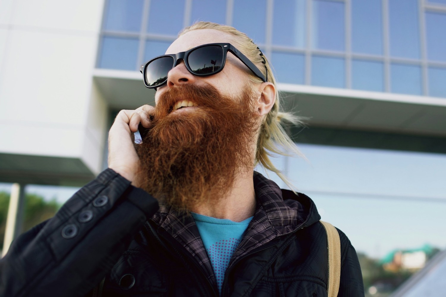 Man with sunglasses and a red beard