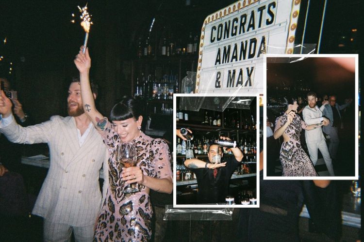 two people in fancy clothes holding sparklers
