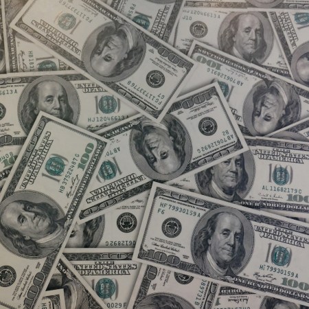 Pile of hundred dollar bills