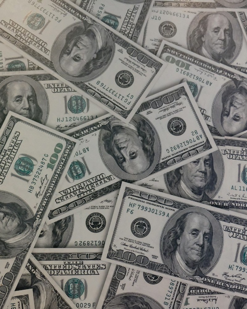 Pile of hundred dollar bills