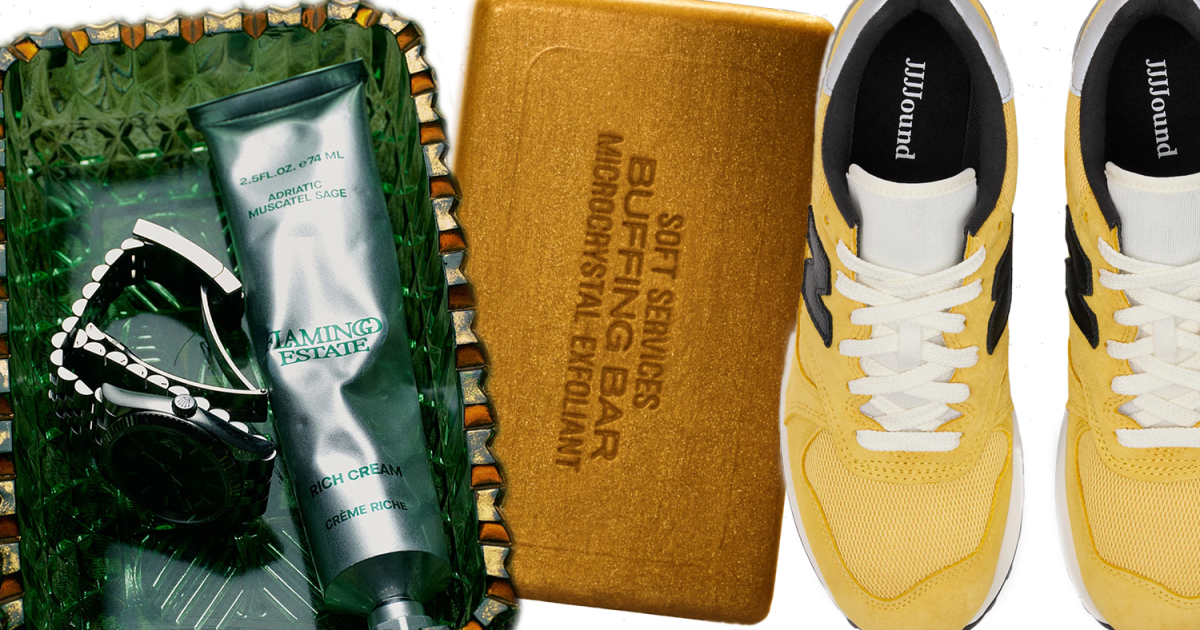 A glass tray with handcream on it, a golden bar of soap and yellow sneakers on a white and yellow background.