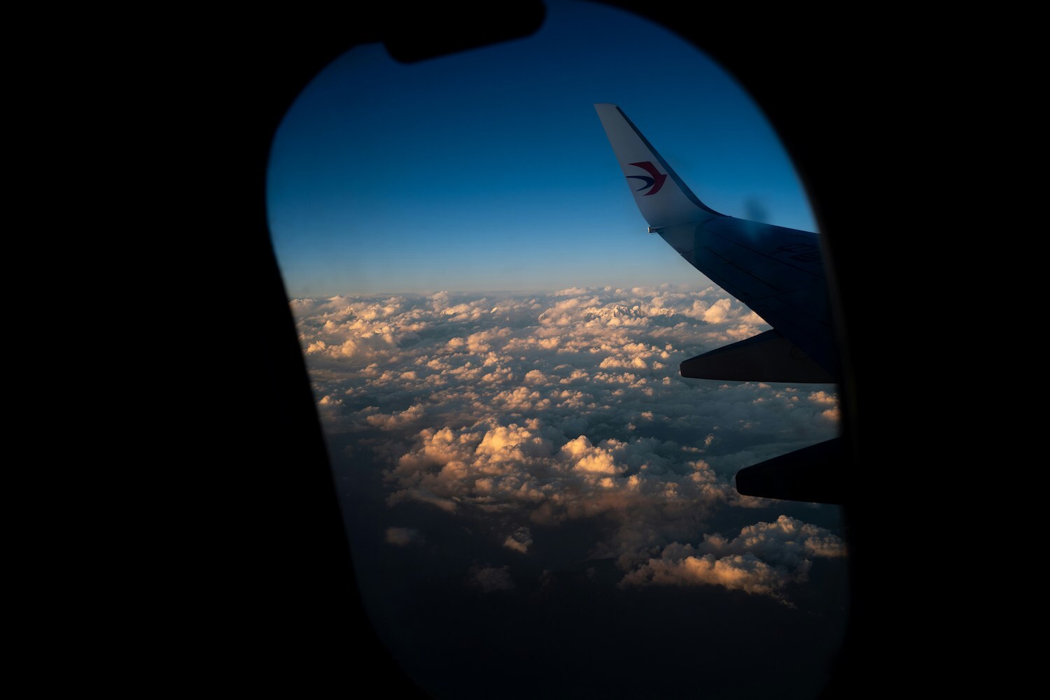 View of clouds from an airplane window