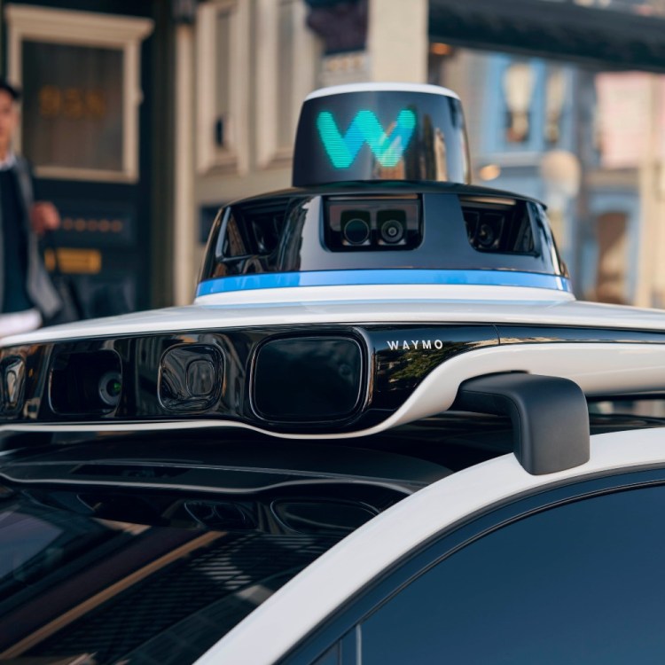 Waymo hardware atop a vehicle