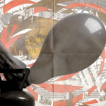 A person blowing up a balloon