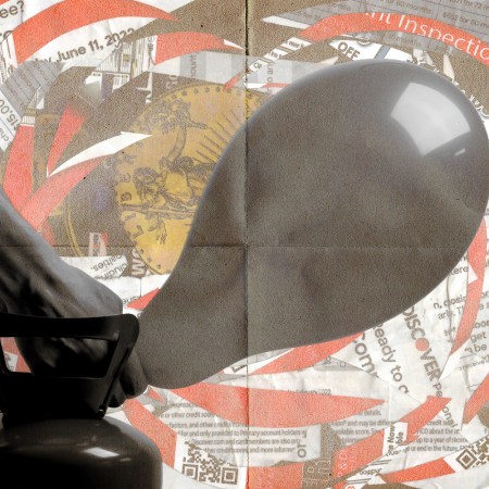 A person blowing up a balloon