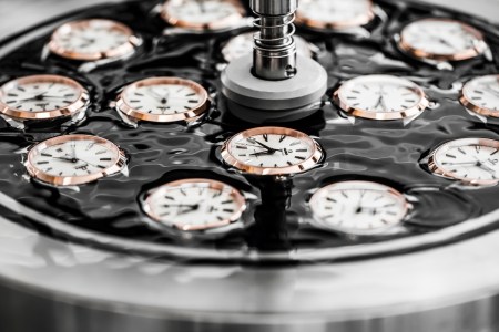 Watch cases sitting in a black disc