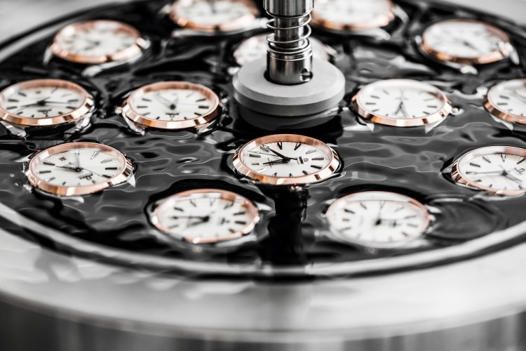 Watch cases sitting in a black disc