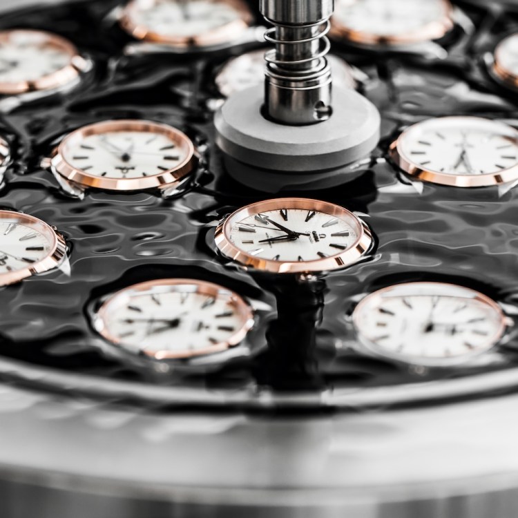 Watch cases sitting in a black disc