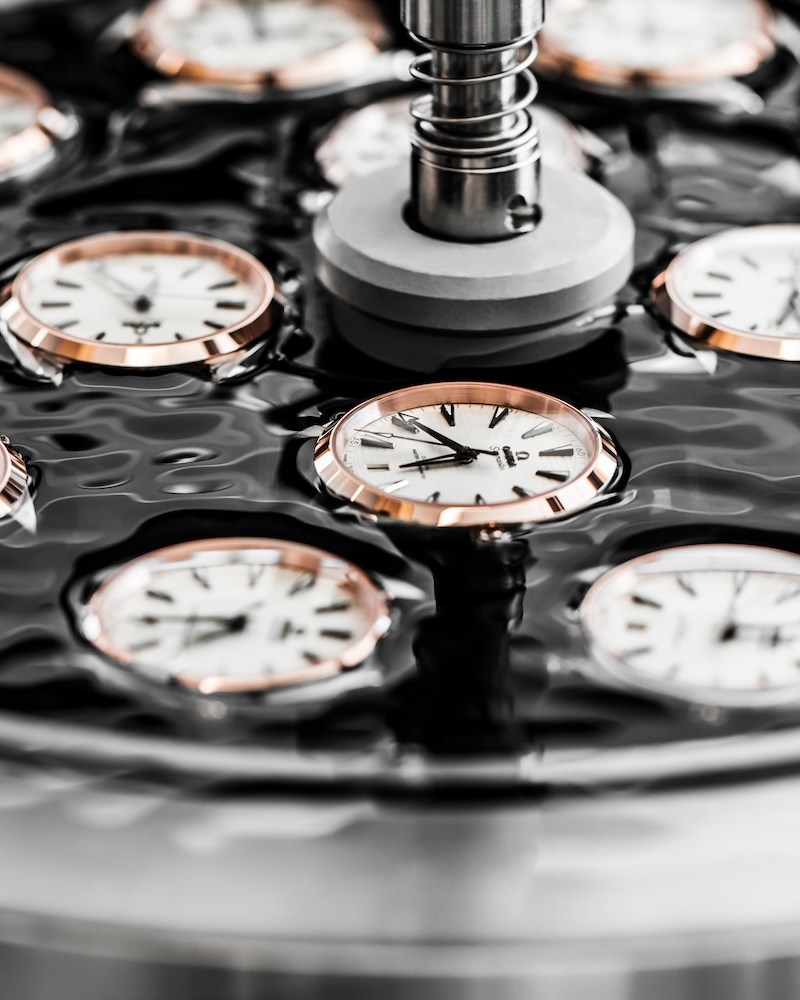 Watch cases sitting in a black disc