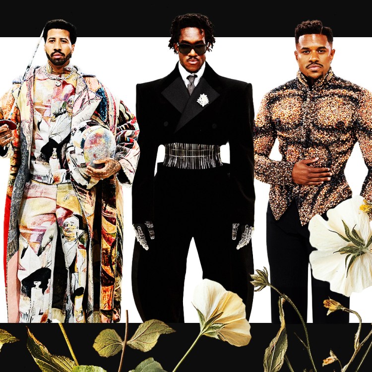Three men in elaborate designer clothes standing in front of a white background surrounded by a black border with flowers growing up from the bottom