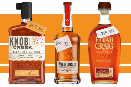 bottles of knob creek, wild turkey 101 8 year and elijah craig small batch lined up on a white background