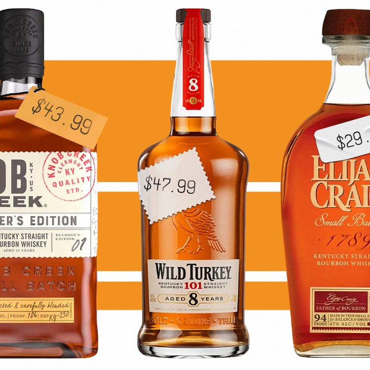 bottles of knob creek, wild turkey 101 8 year and elijah craig small batch lined up on a white background