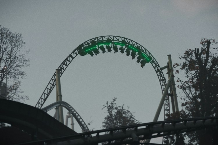 A rollercoaster going upside down.