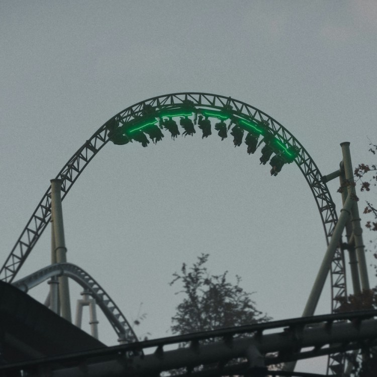 A rollercoaster going upside down.
