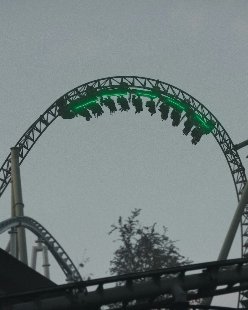 A rollercoaster going upside down.