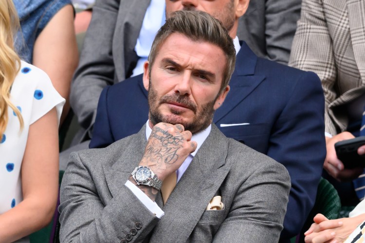 David Beckham watching a tennis match