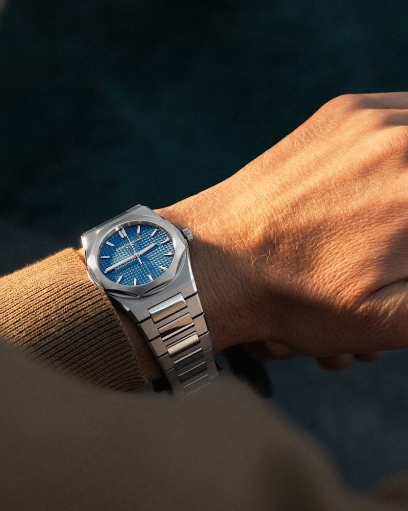 a model wearing the new Girard-Perregaux Laureato Fifty