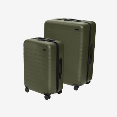 Away luggage bundle - two green bags, one a carry-on, one a larger check-in roller