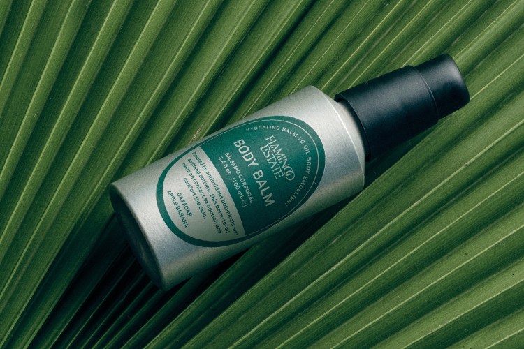 Bottle of Banana Balm on a leaf