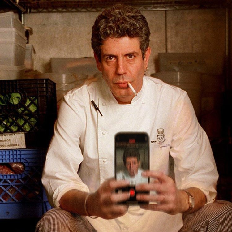 Anthony Bourdain taking a selfie with a cigarette in his mouth