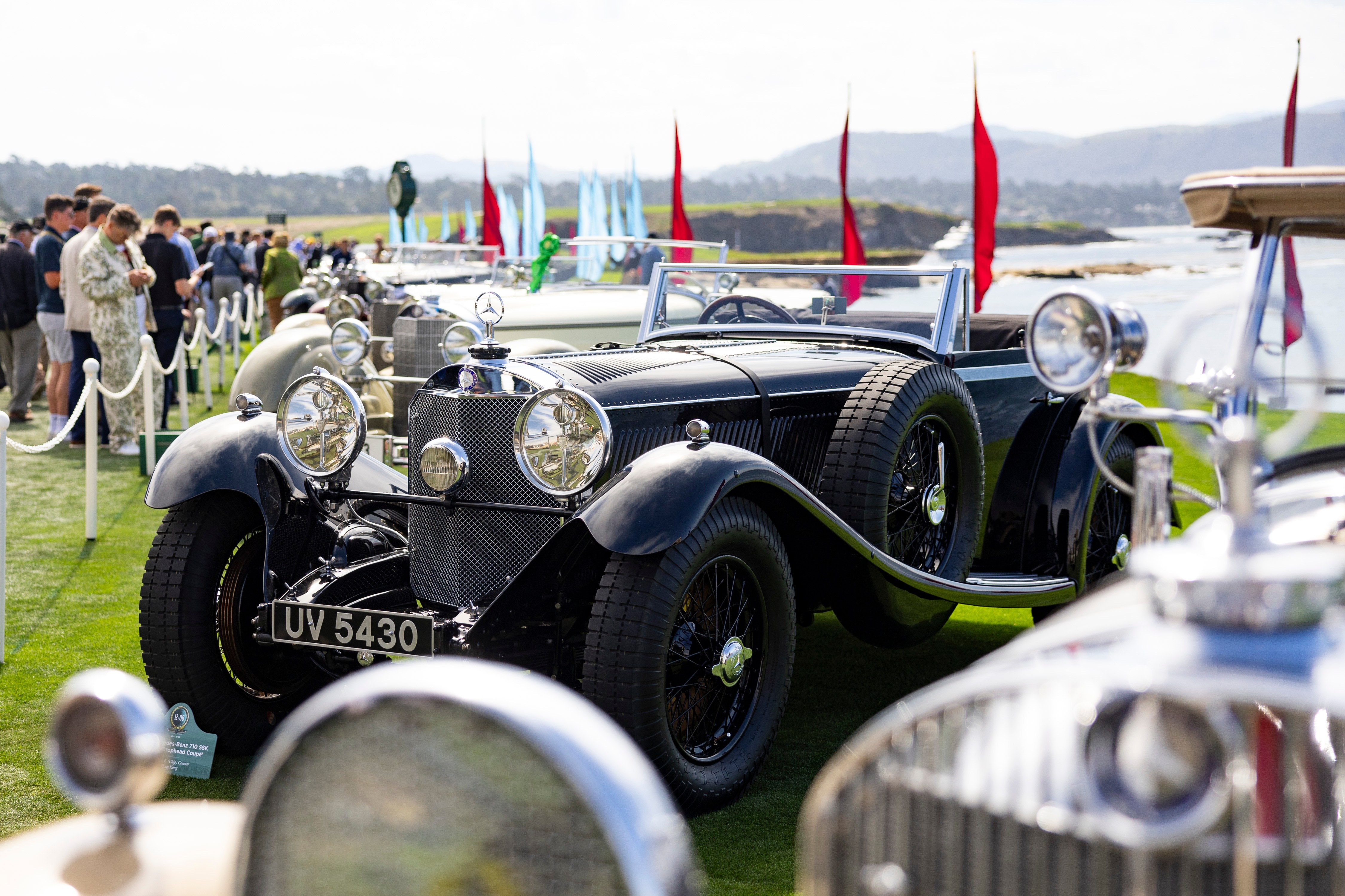 Vintage cars parked at Pebble Beach's Concours d'Elegance.