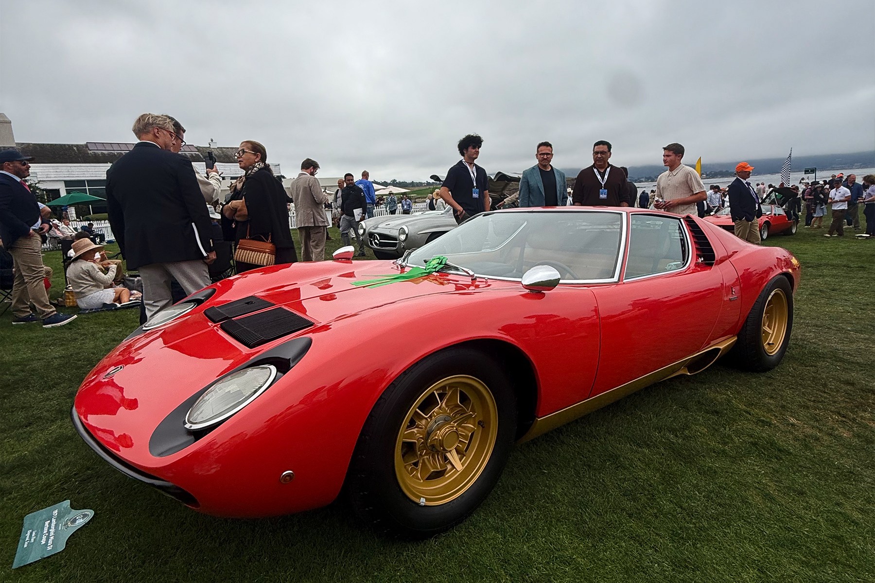 A red Lamborghini Miura parked at Monterey Car Week 2026