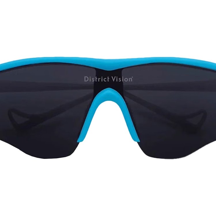 District Vision sunglasses with a bright blue frame and dark lenses, isolated on a white background.