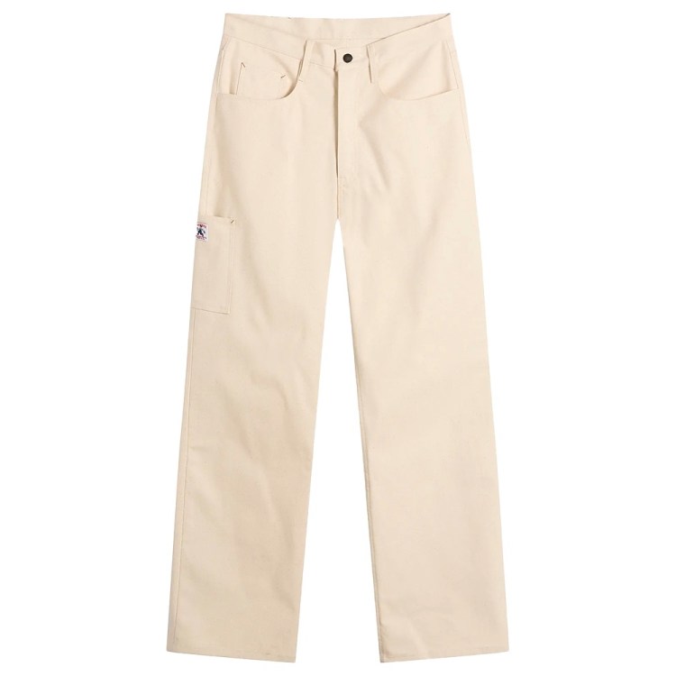 Cream-colored work pants with a small utility pocket on the left thigh and a black button at the waist.