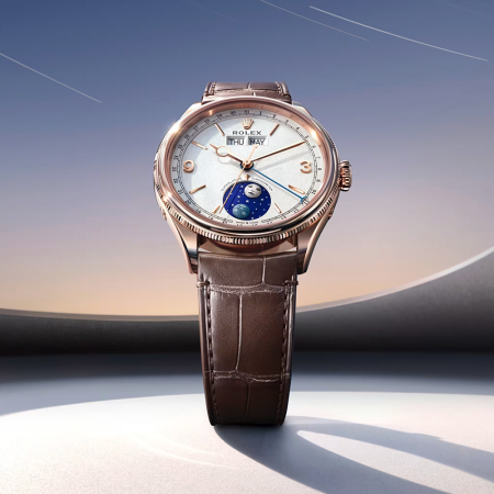Rose gold Rolex Cellini Moonphase watch with a white dial, brown leather strap, and a moon phase indicator.