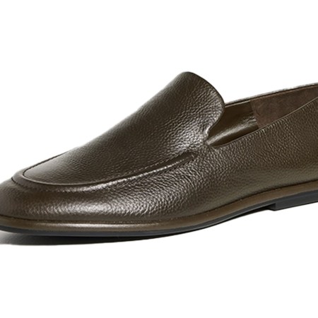 Single olive green leather loafer with a textured finish and a low, flat sole.