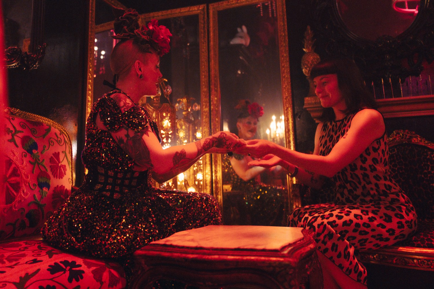 Madame Rosebud giving a lipstick reading at company xiv