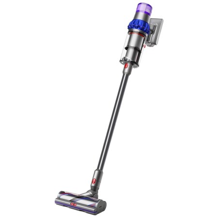 A silver Dyson V15 Detect cordless vacuum cleaner with purple and blue accents, angled on a white background.