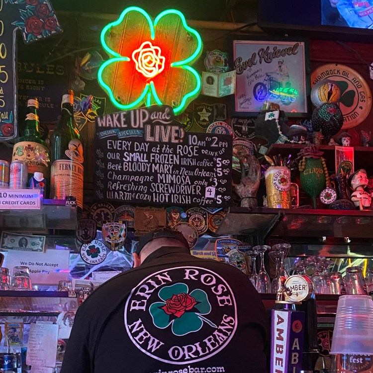 a bartender behind the bar at erin rose in new orleans