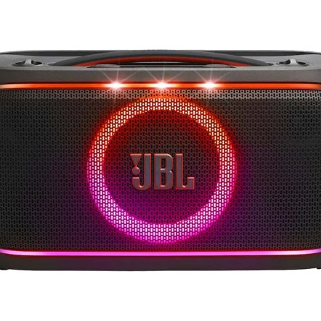 Black JBL speaker with a glowing red and purple circular light around the logo, and a red light strip on top.