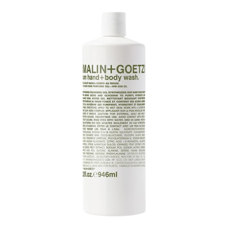 White Malin+Goetz Dark Rum Hand+Body Wash bottle with green text, including ingredients and directions.