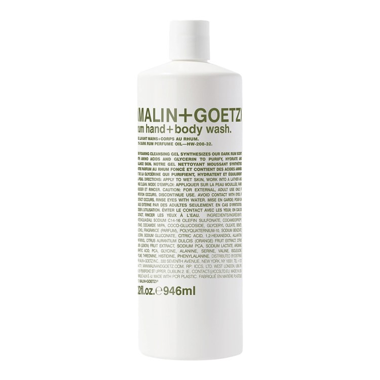 White Malin+Goetz Dark Rum Hand+Body Wash bottle with green text, including ingredients and directions.