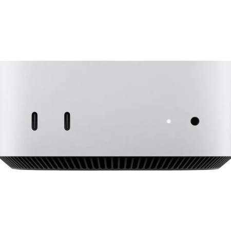 Silver Mac Studio desktop computer with two USB-C ports, a white light, and a black button on the front.