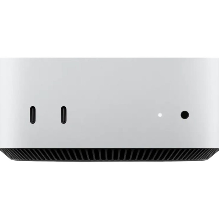 Silver Mac Studio desktop computer with two USB-C ports, a white light, and a black button on the front.
