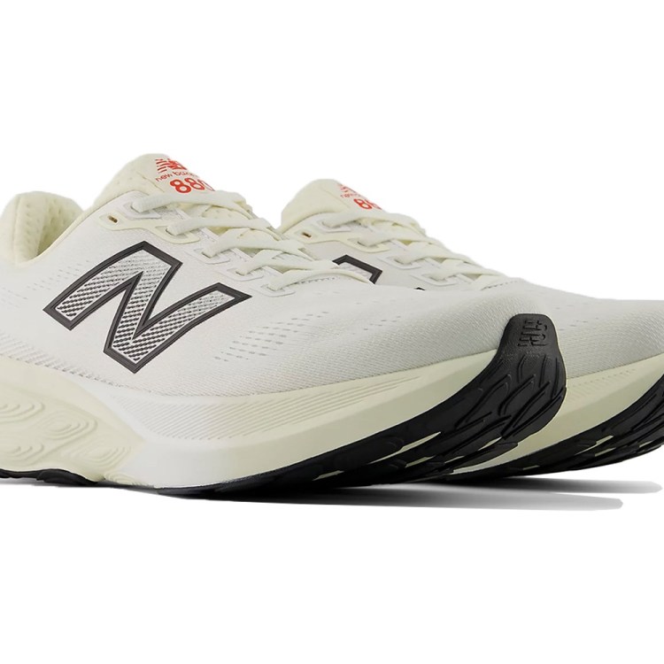 Pair of white New Balance 880 running shoes with black soles and an "N" logo on the side.