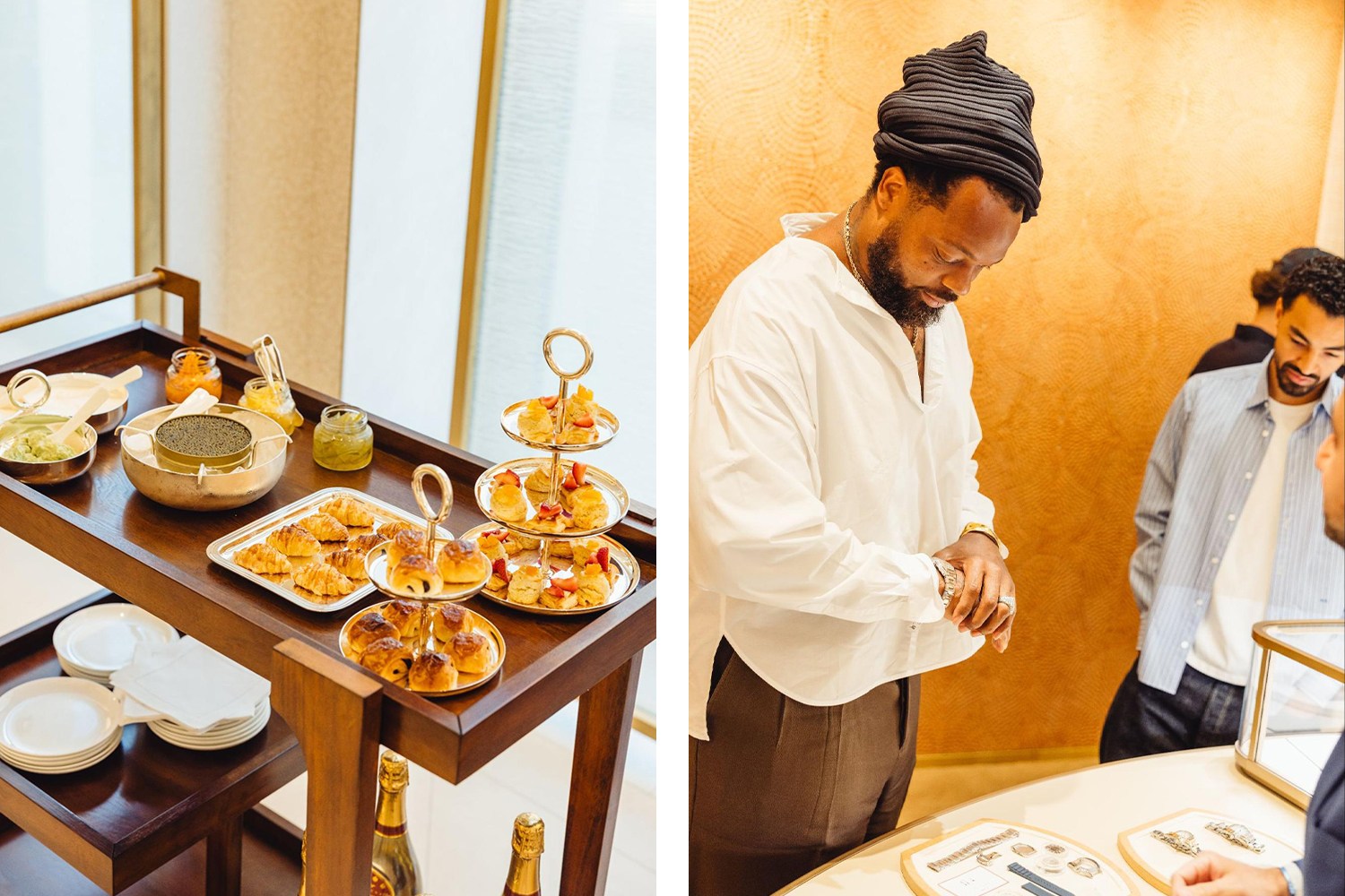 A man in a white shirt examines a watch, while a caviar and pastry cart sits nearby.