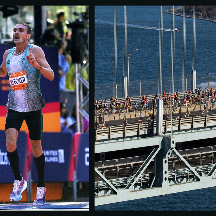 Runner Klecker celebrates at a finish line, while a large group of runners crosses a bridge over water.